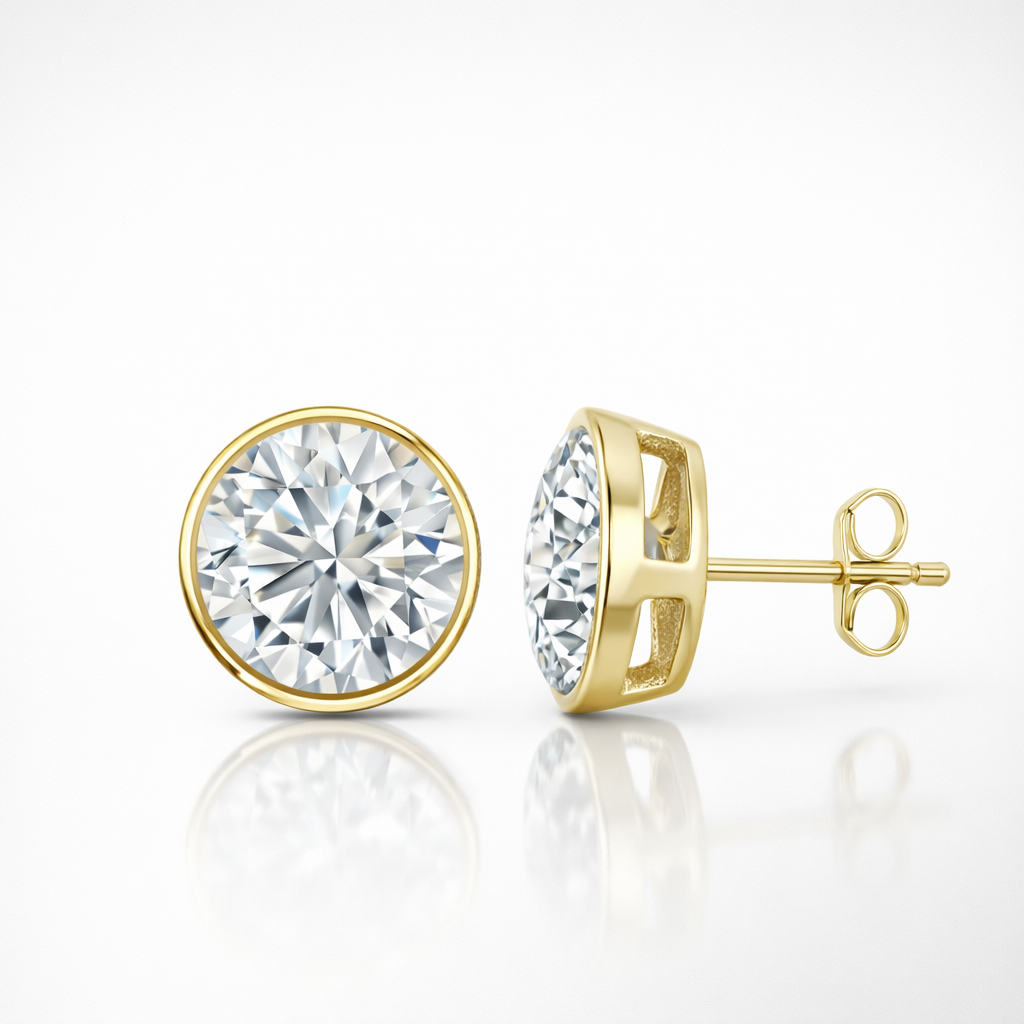 Gold diamond stud earrings on a white background