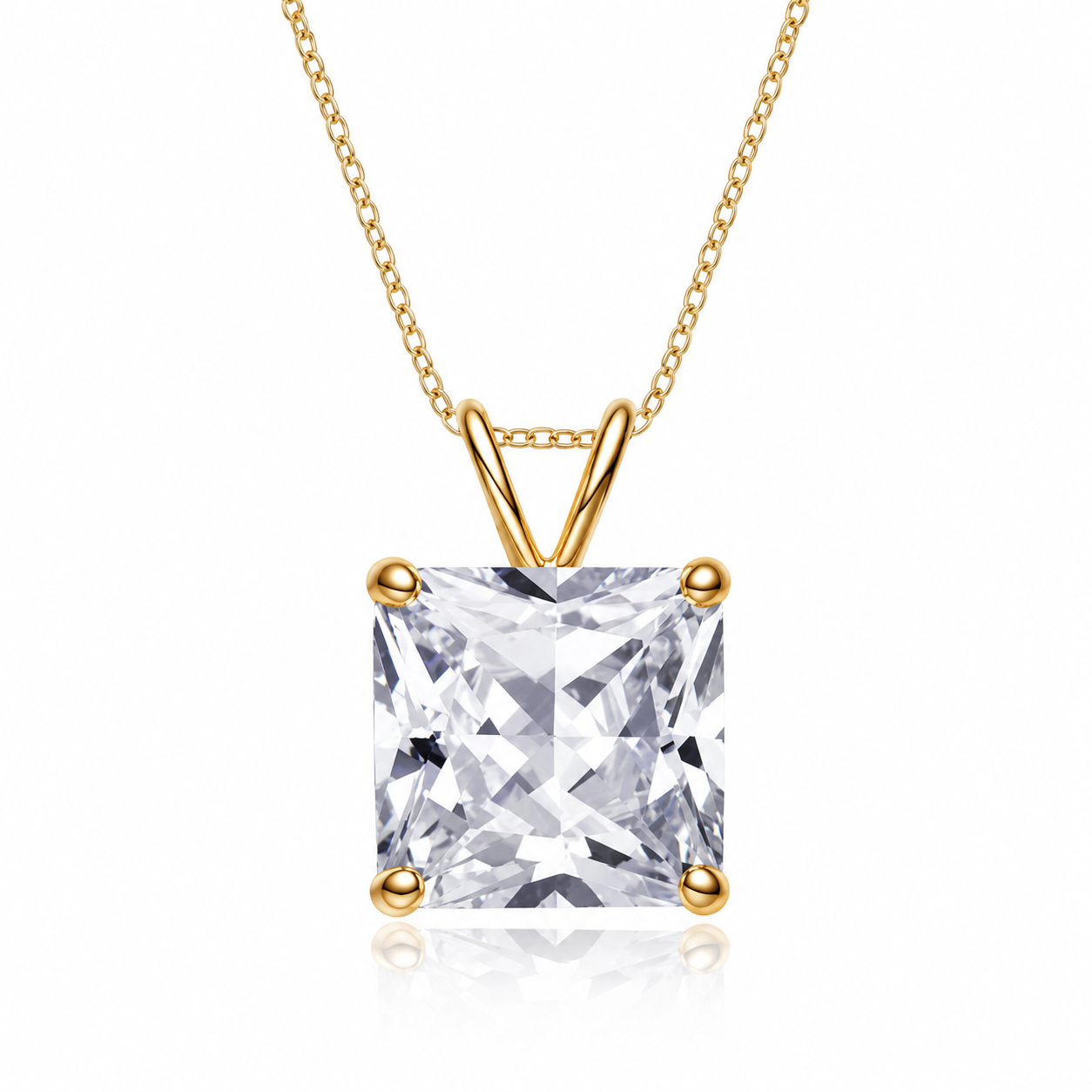 Gold necklace with a square-cut diamond pendant on a white background